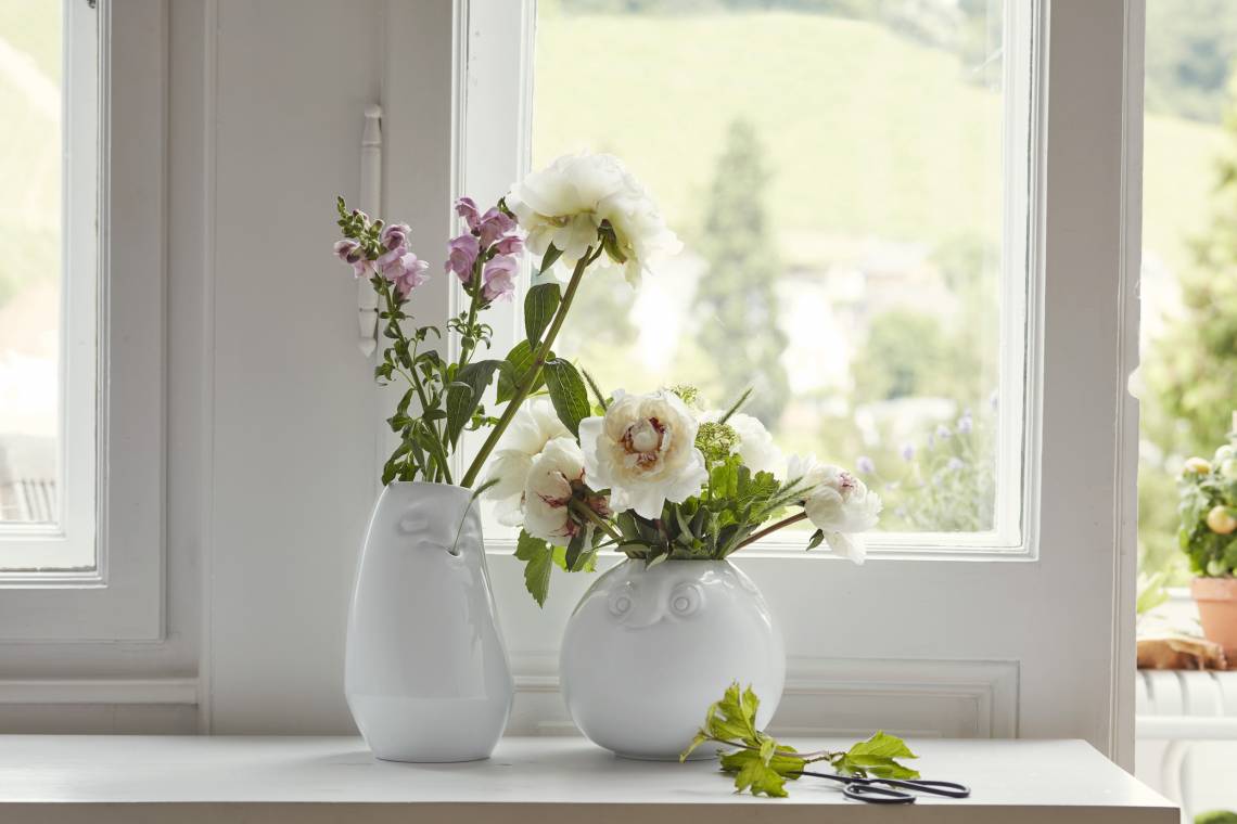 58 Products Blumenvase - Entspannt und amüsiert